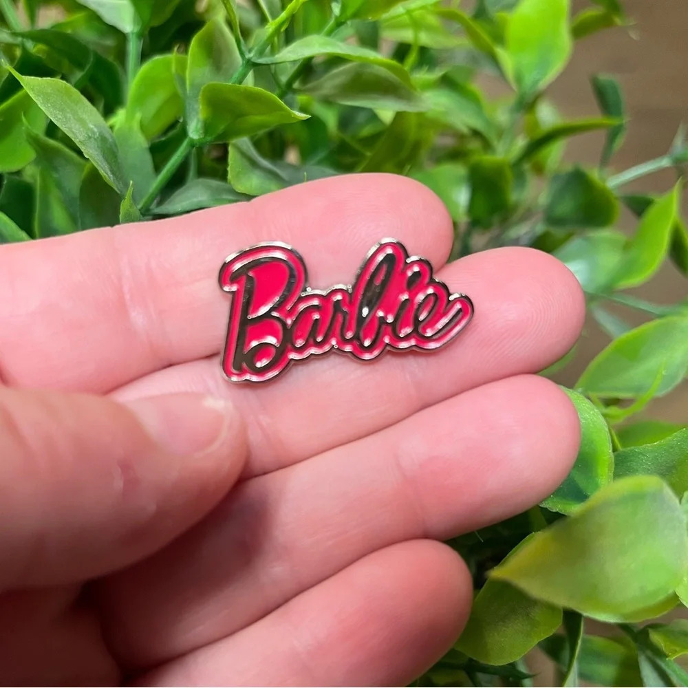 Brand new Barbie signature silver/pink enamel pin